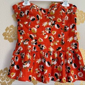 Orange top with floral print